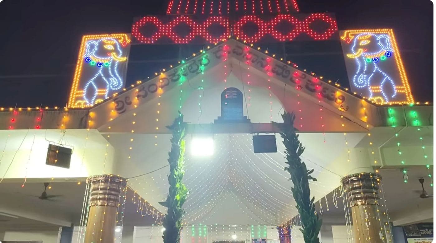 The temple's entrance decorated with lights during a previous Annual Temple Festival celebration.